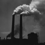 Factory smoke coming out of a pipe