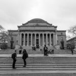 Photo of Columbia university building with statue of Alma Mater