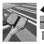Tactile maps held in hands