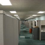 How a rising minimum wage may impact the nonprofit sector - office cubicles