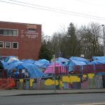 "Nickelsville" homeless encampment (named after Seattle Mayor Greg Nickels) towards the end of its 3-month stay in the parking lot of the University Congregational United Church of Christ in the University District, Seattle, Washington.