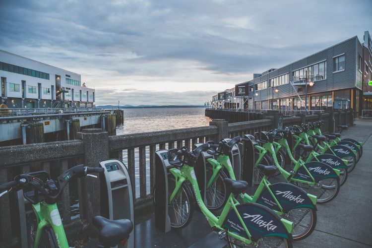 Seattle’s docked bike-share program, Pronto, had problems shifting into a higher gear, and the city ended the program in 2017. Pronto bikes are seen here along Seattle’s waterfront.