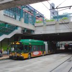 The Downtown Seattle Transit Tunnel's International District/Chinatown station with several King County Metro buses. This view is from the northbound platform, looking north. The nearest bus is No. 6846, a 2008 New Flyer DE60LF hybrid bus. This station opened in 1990, for use by dual-mode buses (diesel/trolley) that operated as trolleybuses in the tunnel. Several years later it was modified for use additionally by Sound Transit Link light rail, and Link service began in 2009.