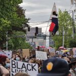 Protesters marching up Pine Street on Capitol Hill, as part of the George Floyd protests.