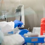 Pennsylvania Commonwealth microbiologist Kerry Pollard performs a manual extraction of the coronavirus inside the extraction lab at the Pennsylvania Department of Health Bureau of Laboratories on Friday, March 6, 2020.