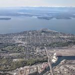 Aerial view of West Seattle and the Puget Sound and Olympic Mountains to the west