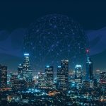 Futuristic city-scape with network above.