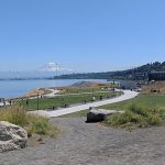 View of Dune Peninsula, with Point Ruston and Mount Rainier in the distance.