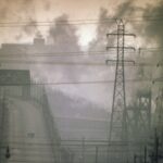 Smoky environment with power lines, factory chimneys and roadway in Cleveland, Ohio 1973
