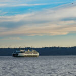 A ferry crossing Puget Sound at dusk.