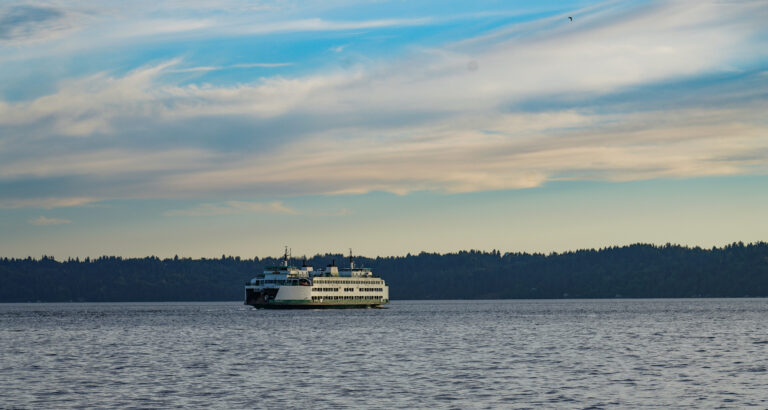 A ferry crossing Puget Sound at dusk.